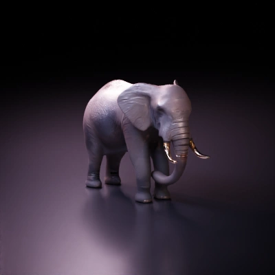 Elephant with long tusks and large ears.