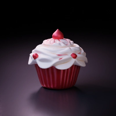 Cupcake with swirled frosting, decorative toppings.