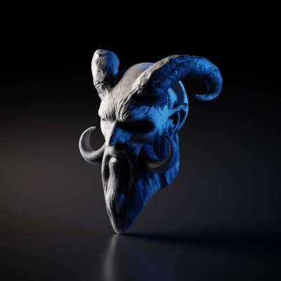 Demonic face with horns, menacing expression.