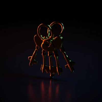 Golden ornate keys, intricate design, four keys.