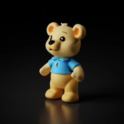 Cute teddy bear wearing a blue shirt.