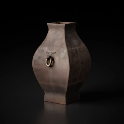 Iron ancient Chinese ding with ring handles.