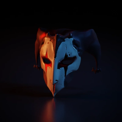 Jester-like mask with sinister design, hollow eyes.