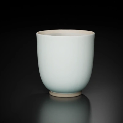 Ceramic coffee mug with handle.