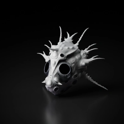 ornate alien mask with spiked projections.