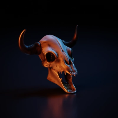 Bull skull with horns and open mouth.