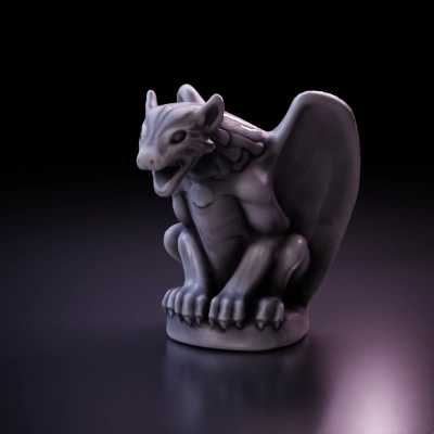 Gargoyle statue with wings, roaring face.