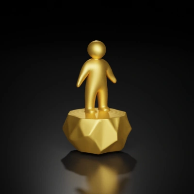 Human-shaped figure on a faceted base, simplistic design.