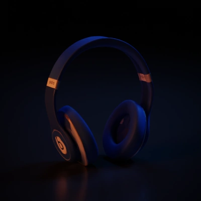 Over-ear headphones, plush ear cushions, sleek design.