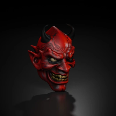 Demonic mask with horns and fangs.