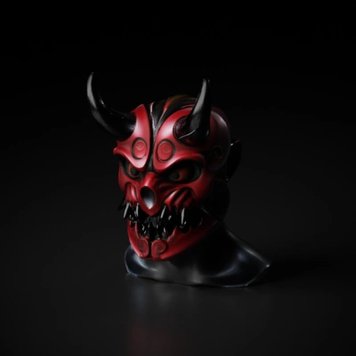 Red demon mask with horns and swirls.