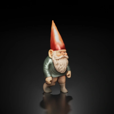Garden gnome figurine with red hat.