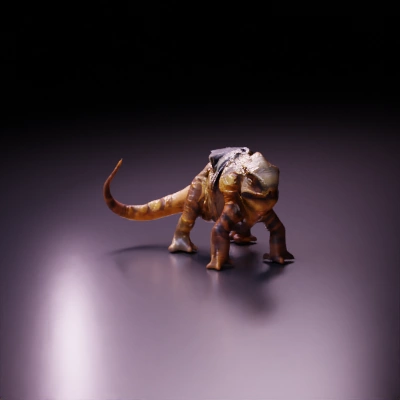 Reptilian creature with rugged texture and tail.