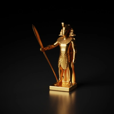 Golden pharaoh statue holding scepter.