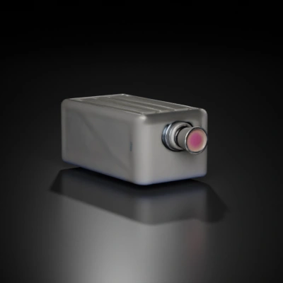Rectangular device with a lens and grooves.