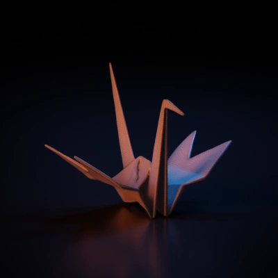 Origami crane, folded paper, traditional art. symmetric geometry, sharp edges, simple geometry