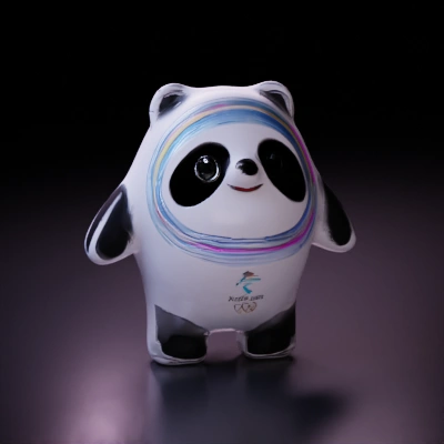 Panda mascot for Olympics, wave gesture.