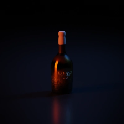 Wine bottle, embossed design on lower half.