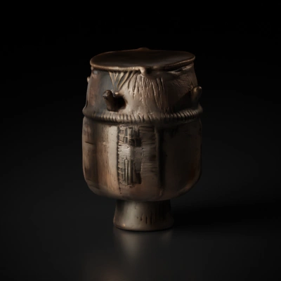 Large ancient drum with detailed carvings.