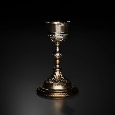 Ornate chalice with pedestal and intricate details.