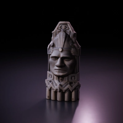 Stone statue, ancient headpiece, solemn expression.