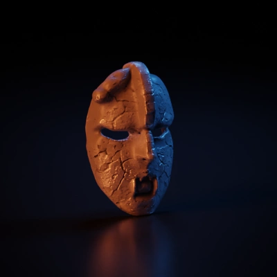 Stone-like mask with vampire fangs.