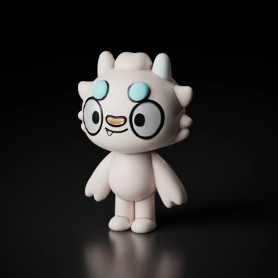 Cartoon monster with horns, round eyes, smiling.