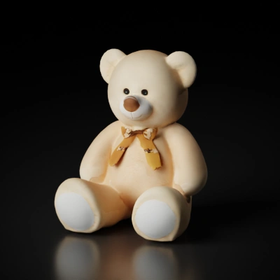 Stuffed teddy bear toy with bow.