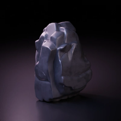 Large fragmented stone with cracks, irregular surface.