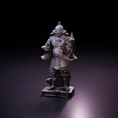 Traditional warrior statue in elaborate armor.